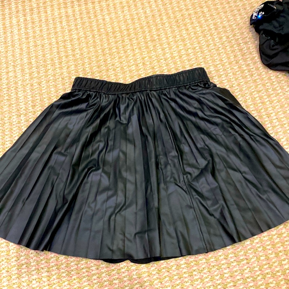 Mini pleated leather skirt